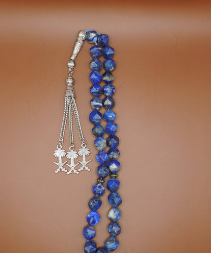 Close-up of lapis lazuli beads showing gold pyrite flecks