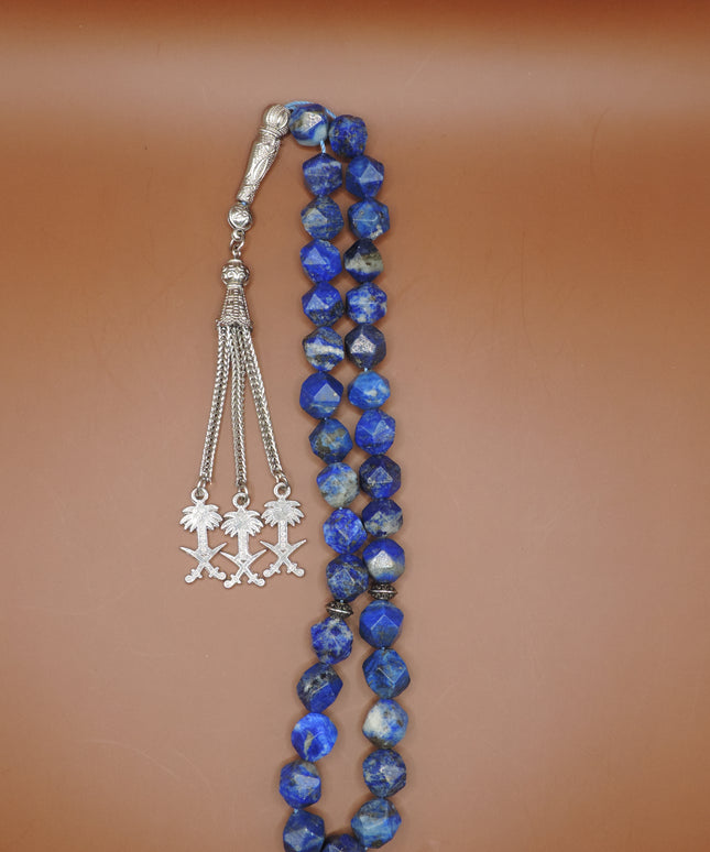 Close-up of lapis lazuli beads showing gold pyrite flecks