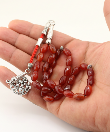 مسبحة/خرز صلاة من العقيق الأحمر (أجيت) ذي الأوجه