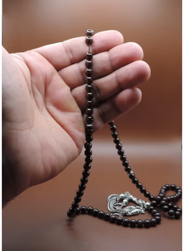 Detail view of garnet stone beads with smooth finish
