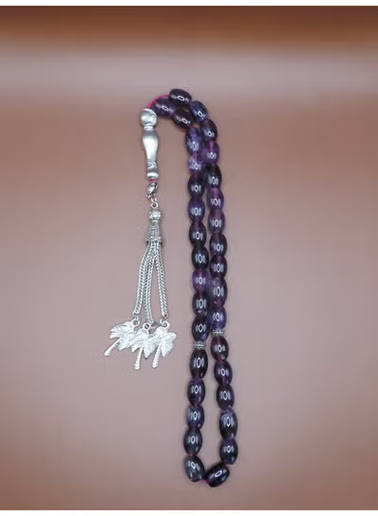 Close-up of oval-shaped amethyst gemstone beads