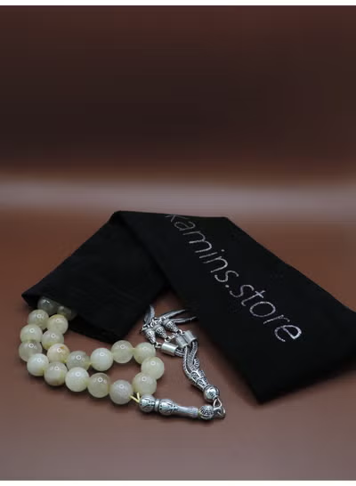 Citrine tasbih prayer beads with decorative feather charms