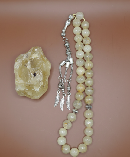 Complete citrine tasbih with bohemian feather embellishments